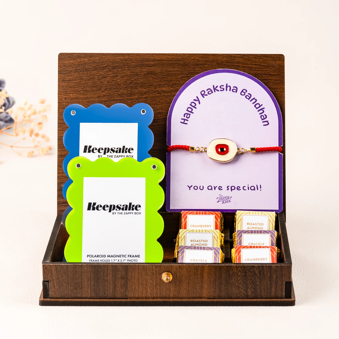 evil eye rakhi with chocolates and photo frame hamper with front