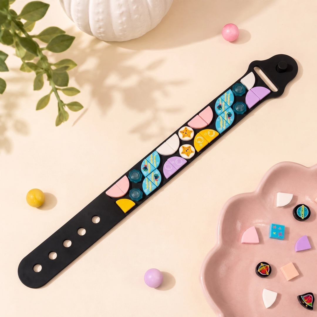 silicone watch strap with a colorful retro pattern of cartoon characters and fruit slices, 