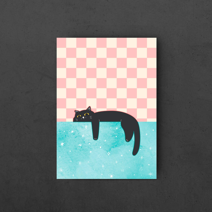 Cozy Dreamer Lazy Cat Wall Art Poster, pastel background, and black cat lying on the pastel blue wall with starts 