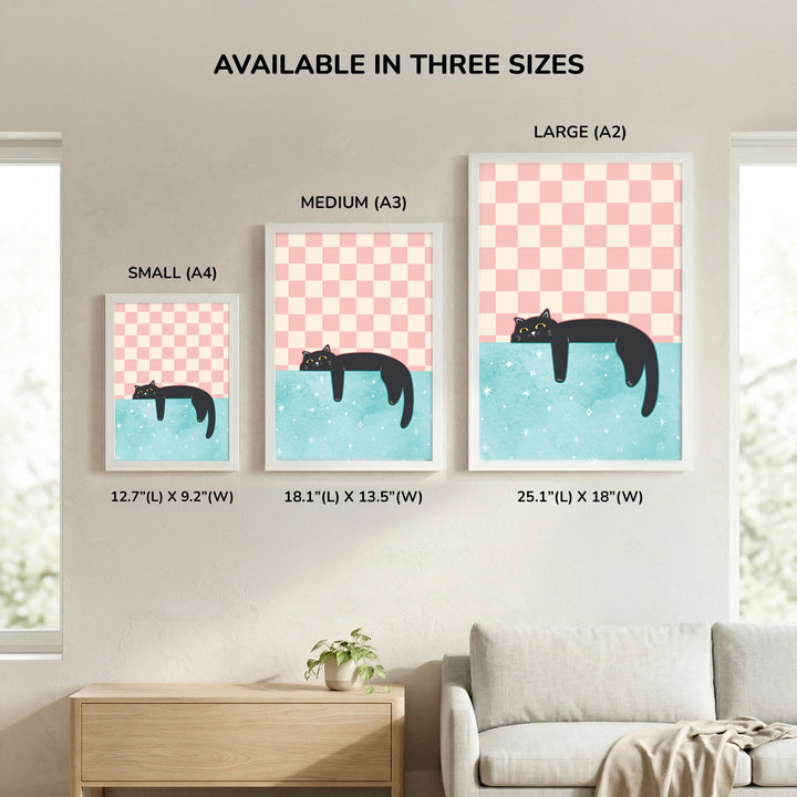 Cozy Dreamer Lazy Cat Wall Art - size comparison showing Small A4, Medium A3, and Large A2 frame options displayed together on a wall