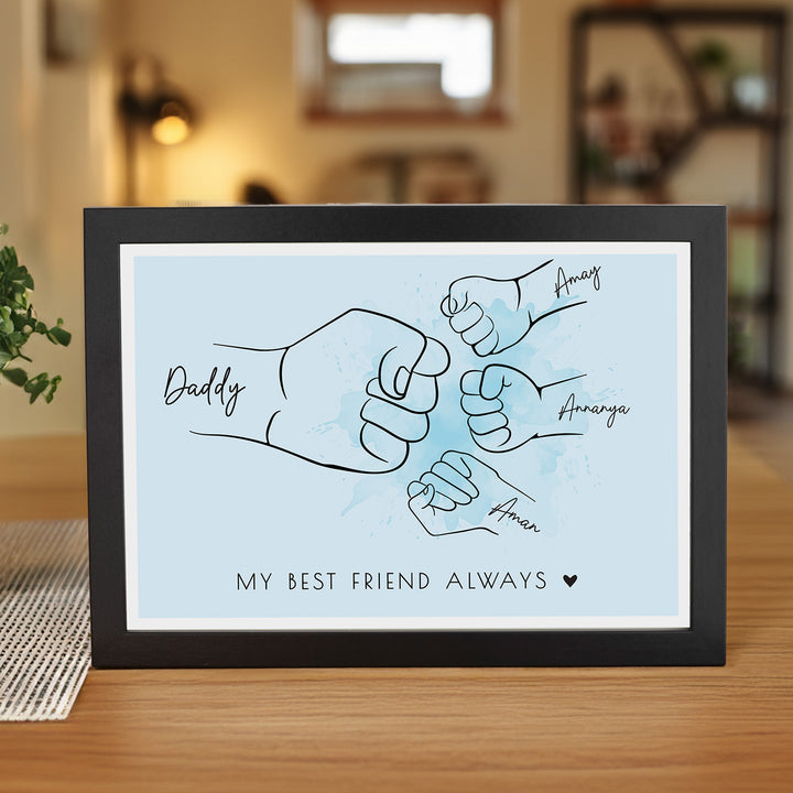 Fist Bump With Dad A4 frame displayed on a desk with planter on the left 