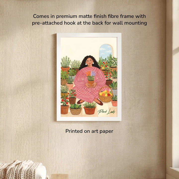 Garden Of Her Own Wall Art Frame - framed print leaning against a beige wall with a pumpkin nearby, includes note about pre-attached hook for easy mounting