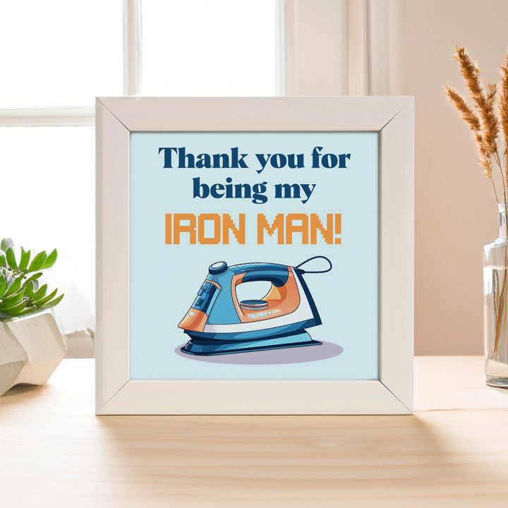 Ironman quote frame placed on the table, white frame 5" x 5" 