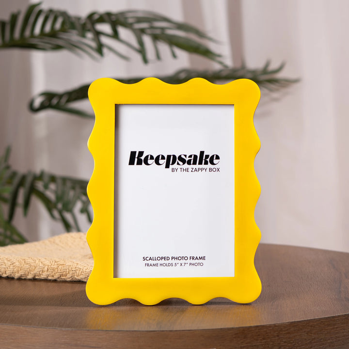 Scalloped Aesthetic Pastel Yellow Frame placed on the table, wooden frame with matte resin finish 