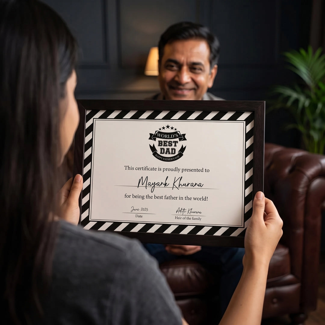 Person holding a framed certificate titled 'World's Best Dad' in a cozy indoor setting.